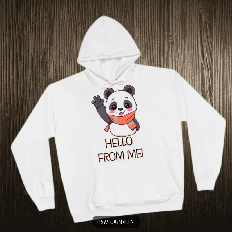 Funny hoodie: a cheerful panda wearing a travel scarf enthusiastically waves hello, offering cozy comfort and welcoming humor.