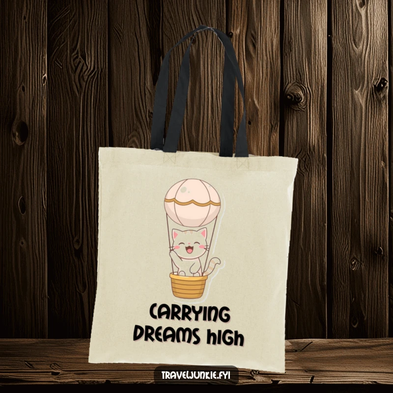 Funny cat tote bag featuring a joyful character adventuring in a miniature hot air balloon, perfect for carrying items with humorous delight.